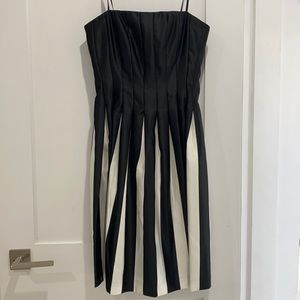 BCBG black and white midi cocktail dress. In perfect condition.